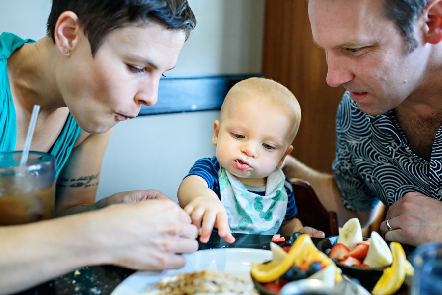 A new family sharing a waffle for their baby's first birthday at Cafe La Maude in Philadelphia.